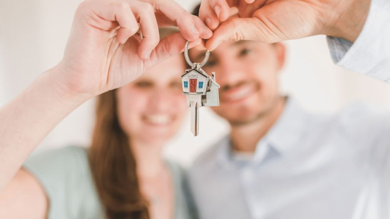 couple buys house