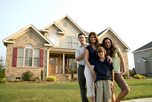 family in front of bakersfield house