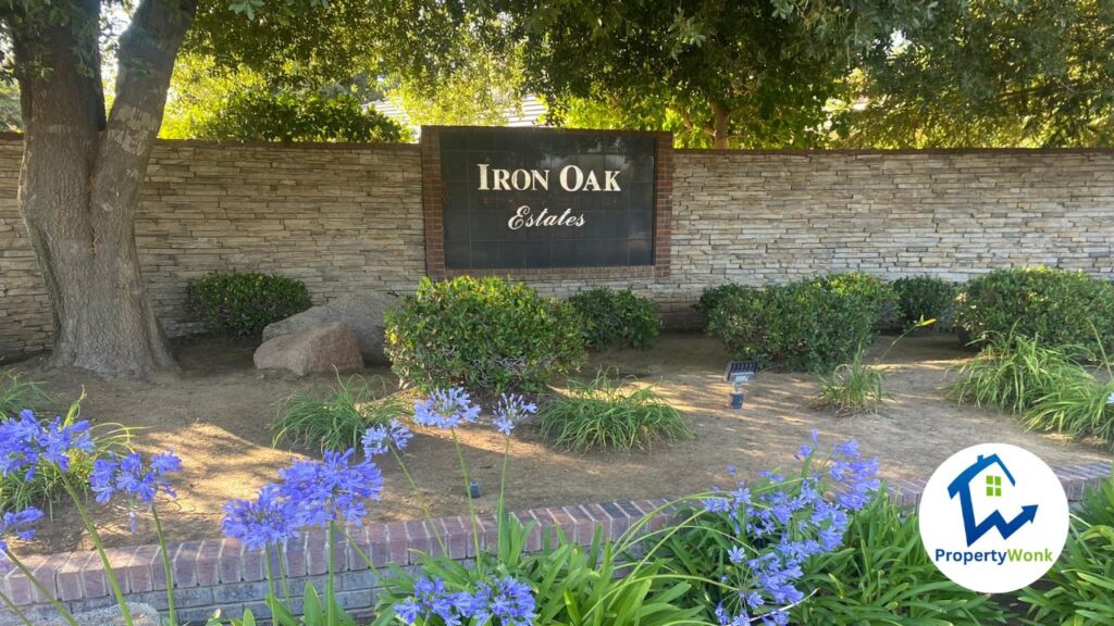 Signage at the entrance to the Iron Oak neighborhood in Bakersfield.