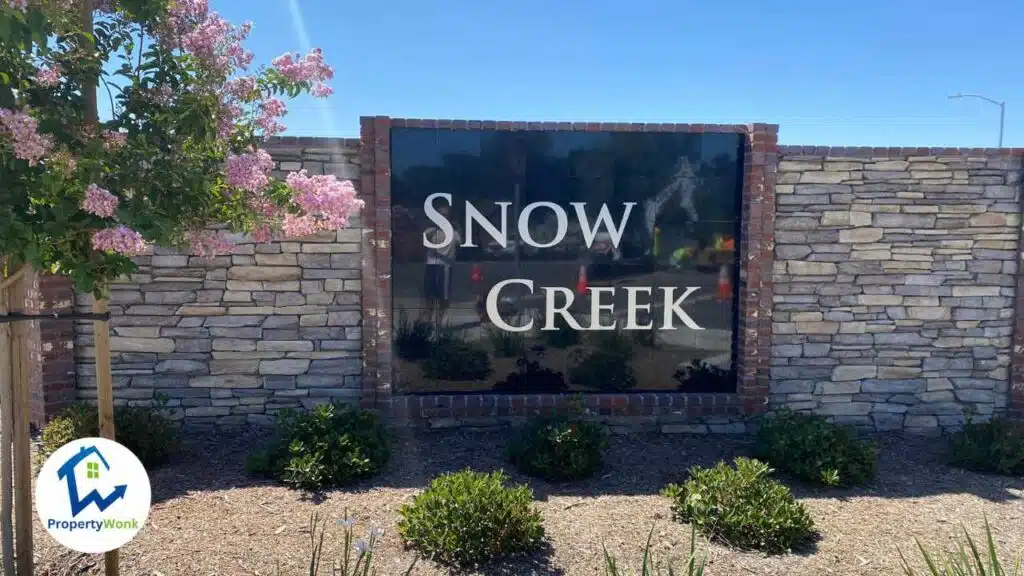 Signage at the entrance to the Snow Creek neighborhood in Bakersfield.