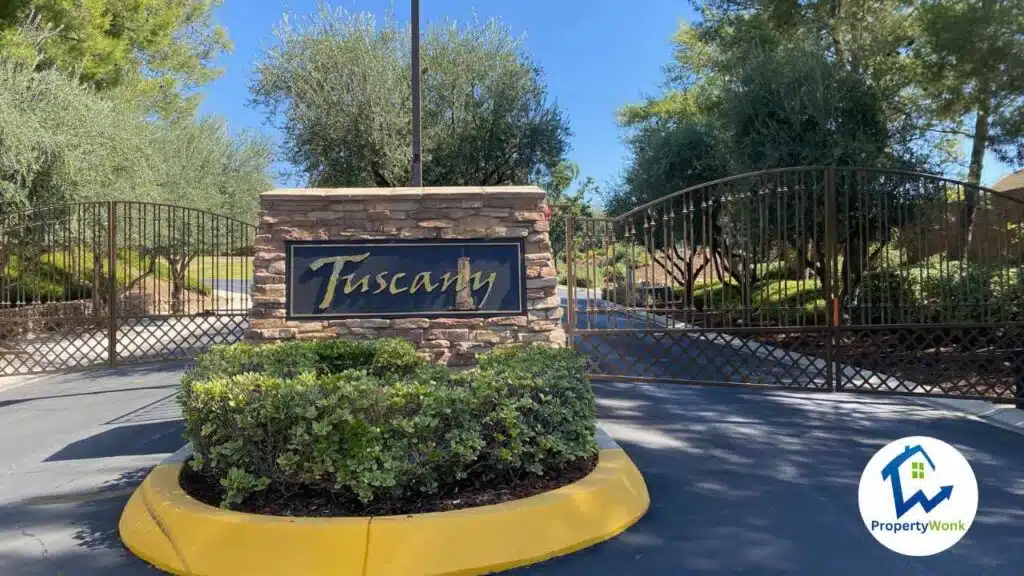 Signage and gate at the entrance to the Tuscany neighborhood in Bakersfield.