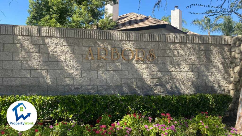 Signage at the entrance to the Arbors neighborhood in Bakersfield.