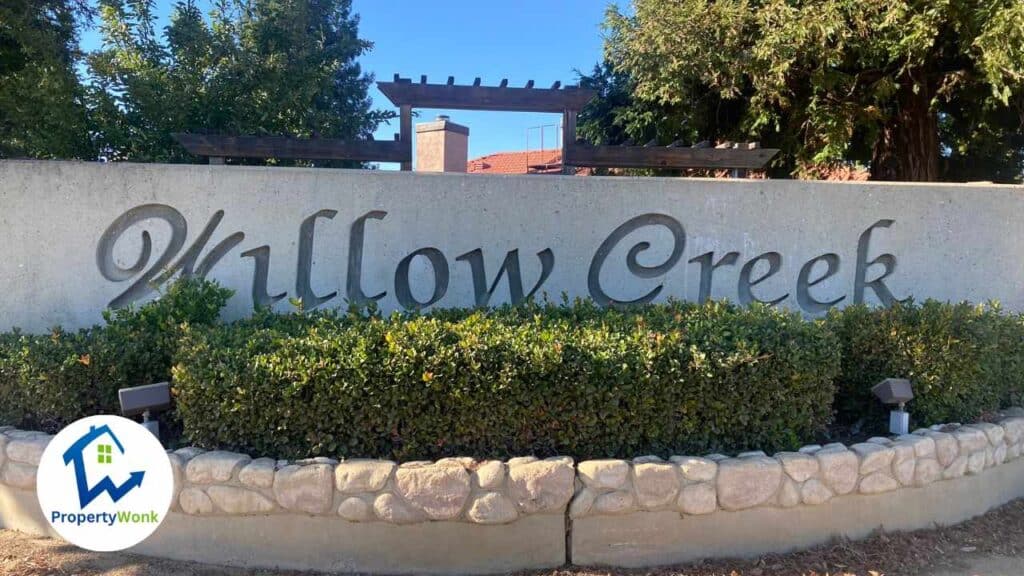 Signage at the entrance to the Willow Creek neighborhood in Bakersfield.