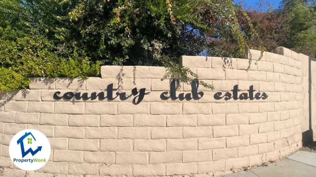 Signage at the entrance to the Country Club Estates neighborhood in Bakersfield.