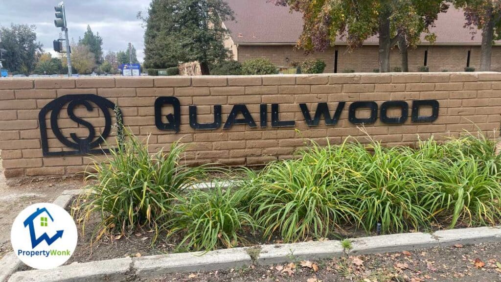 Signage at the entrance to the Quailwood neighborhood in Bakersfield.