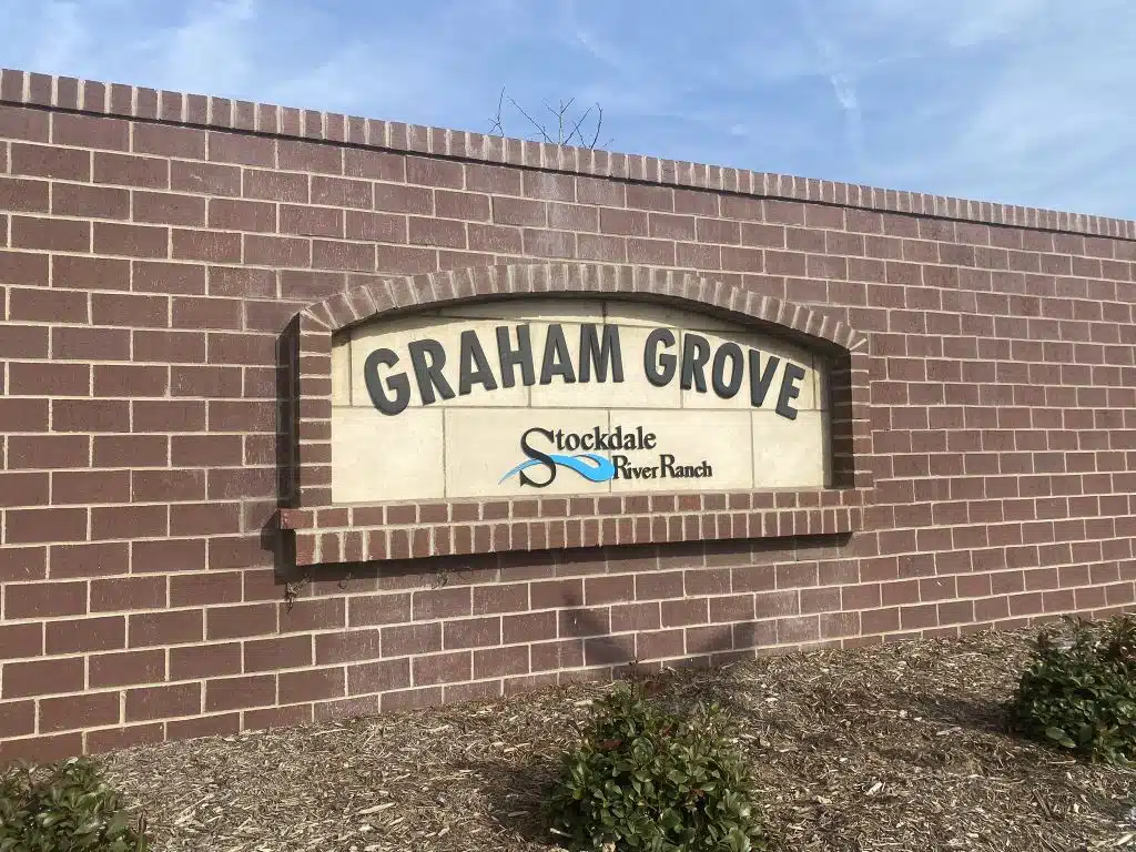 Signage at the entrance to Graham Grove in the Stockdale River Ranch neighborhood in Bakersfield.