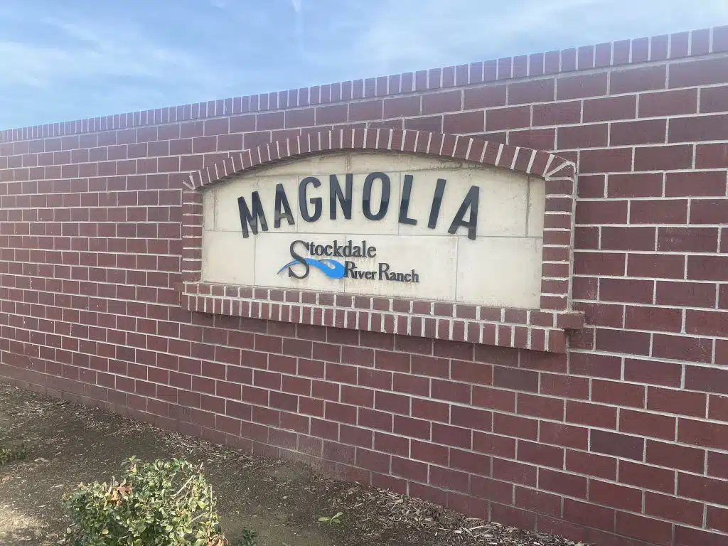 Signage at the entrance to the Magnolia in the Stockdale River Ranch neighborhood in Bakersfield.