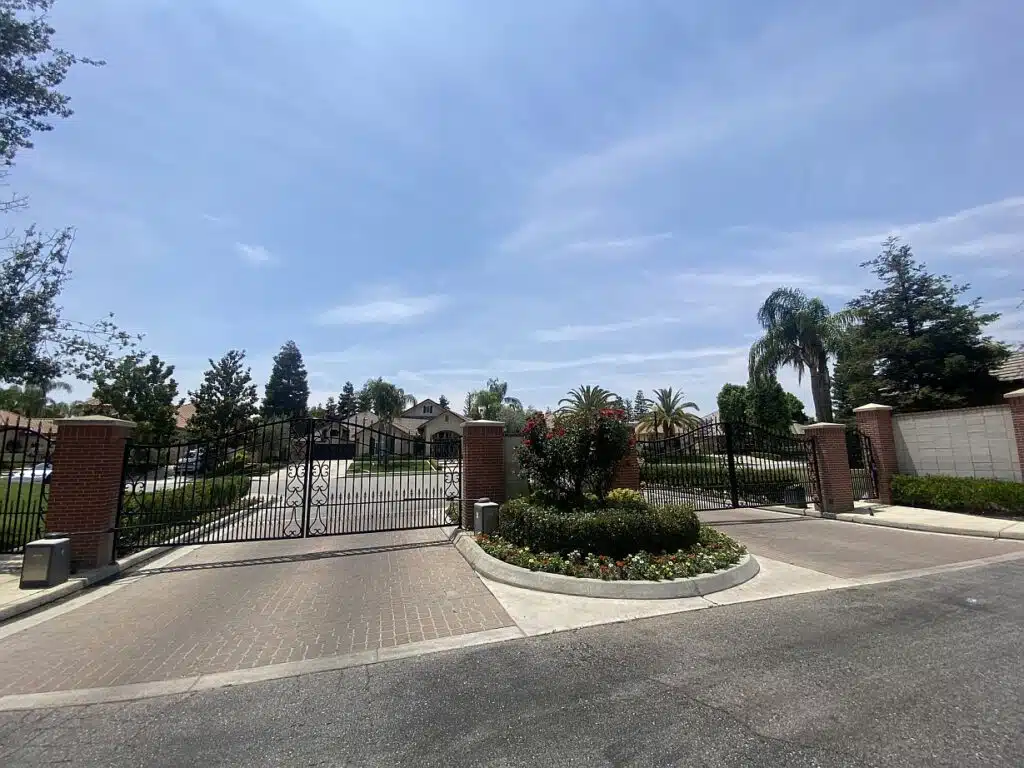 Gate at the entrance to the Trinity Estates neighborhood in Bakersfield.